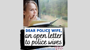 woman writing letter on a train